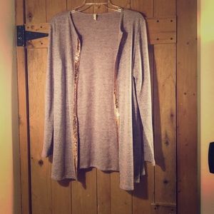 Purple sweater with rose gold trim